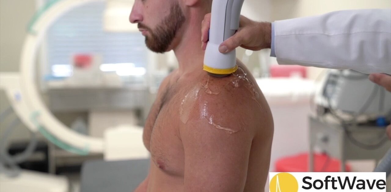 Shoulder Pain Relief with SoftWave Therapy – Synergy Institute Naperv Patient receiving SoftWave Therapy for shoulder pain at Synergy Institute in Naperville