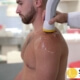 Patient receiving SoftWave Therapy for shoulder pain at Synergy Institute in Naperville